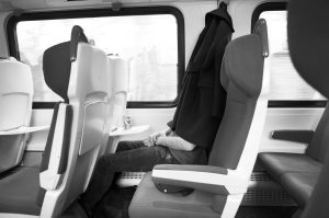 man with coat on head